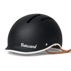 Casque Vélo Thousand Junior (5-11ans) 26 Casque Vélo Thousand Junior (5-11ans) -Magasin De Vélos casque velo thousand enfant junior noir